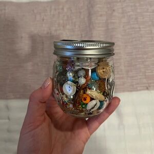 Jar of beads + buttons.